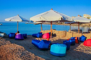 Private beach, sun-loungers, beach umbrellas
