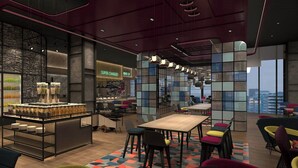 A modern cafe with a bar area, seating, and a view of the city. - Aloft Shijiazhuang (Shijiazhuang)