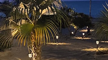On the beach, sun loungers, beach towels