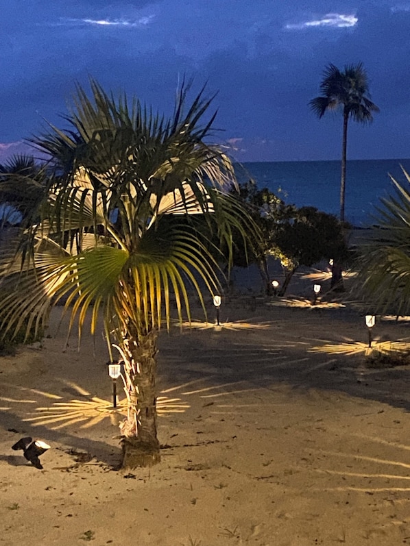 On the beach, sun-loungers, beach towels