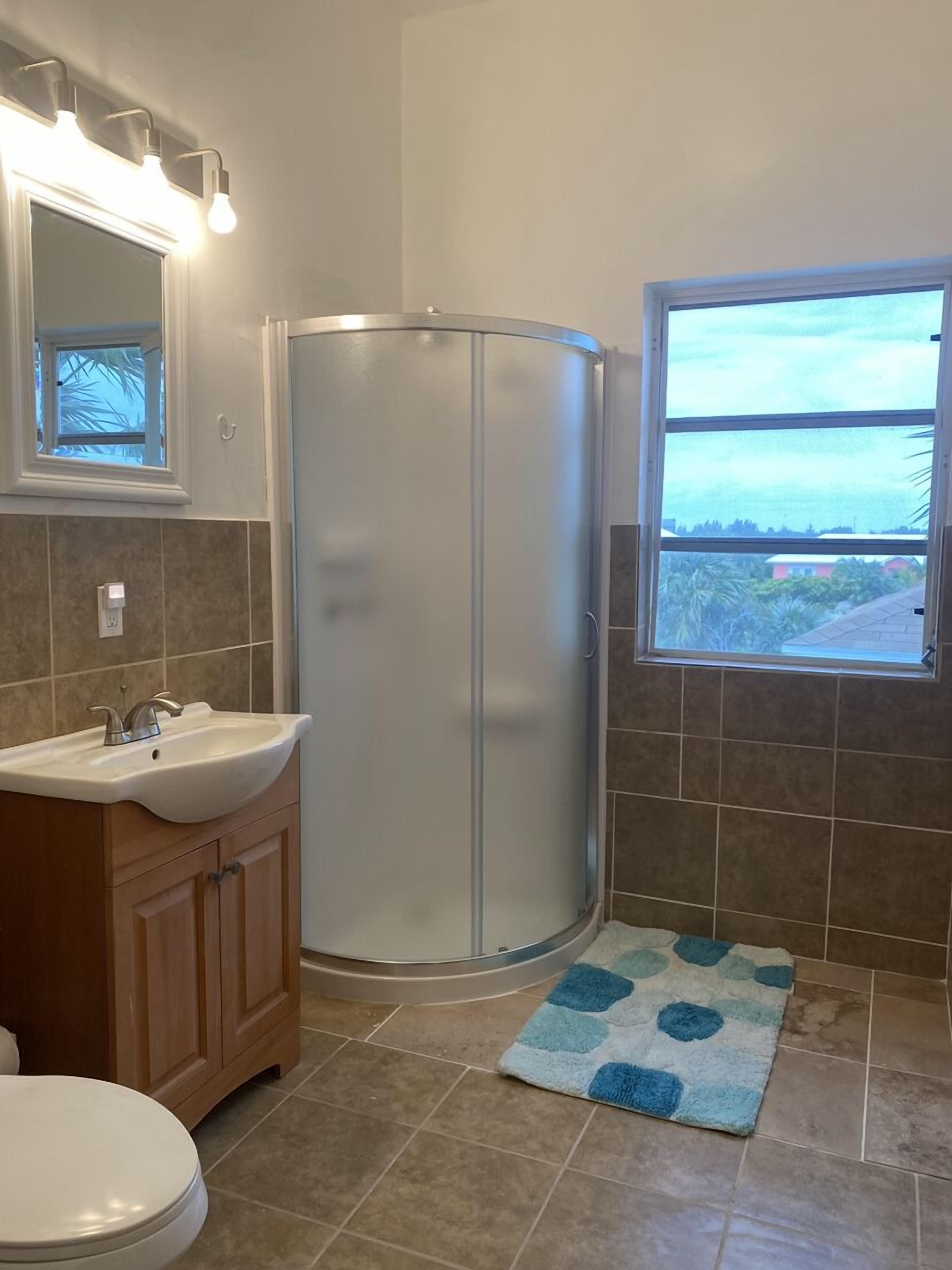 Shower, towels, soap, shampoo