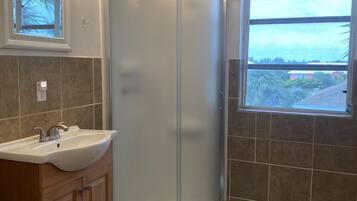 Shower, towels, soap, shampoo