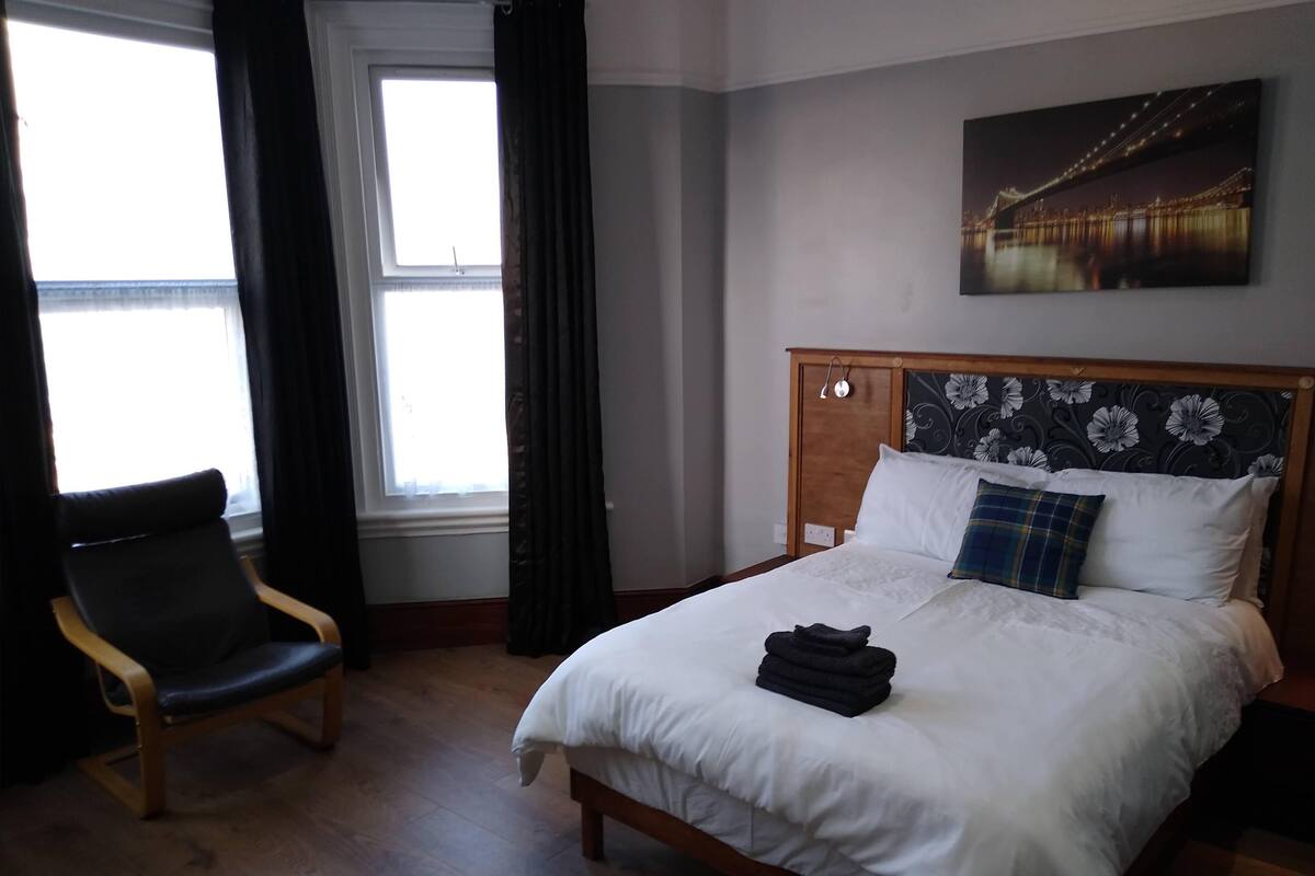 Blackout curtains, iron/ironing board, free WiFi, bed sheets