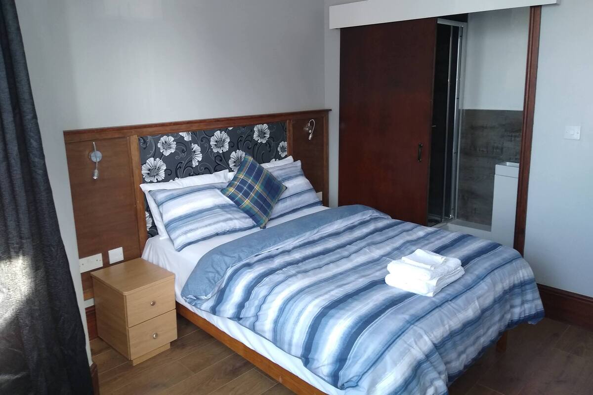 Blackout curtains, iron/ironing board, free WiFi, bed sheets
