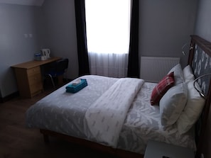 Blackout curtains, iron/ironing board, free WiFi, bed sheets