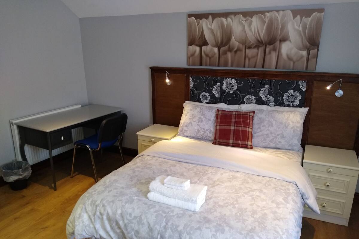 Blackout curtains, iron/ironing board, free WiFi, bed sheets