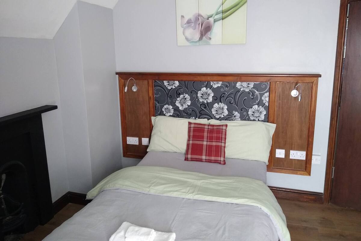 Blackout curtains, iron/ironing board, free WiFi, bed sheets