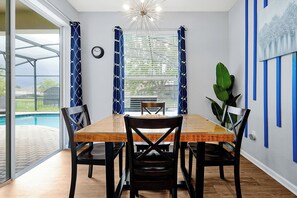 Dining - Villa 7748 - Updated Home w/ Arcade Rm! 3 mi from Disney, Pool Heat, BBQ & PS5 (Kissimmee)
