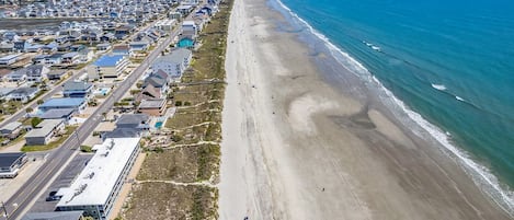 On the beach, sun-loungers, beach towels