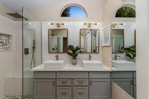 Combined shower/tub, hair dryer, towels, soap