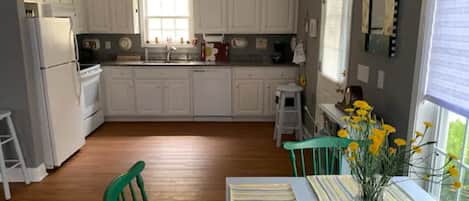 Microwave, dishwasher, coffee/tea maker, cookware/dishes/utensils