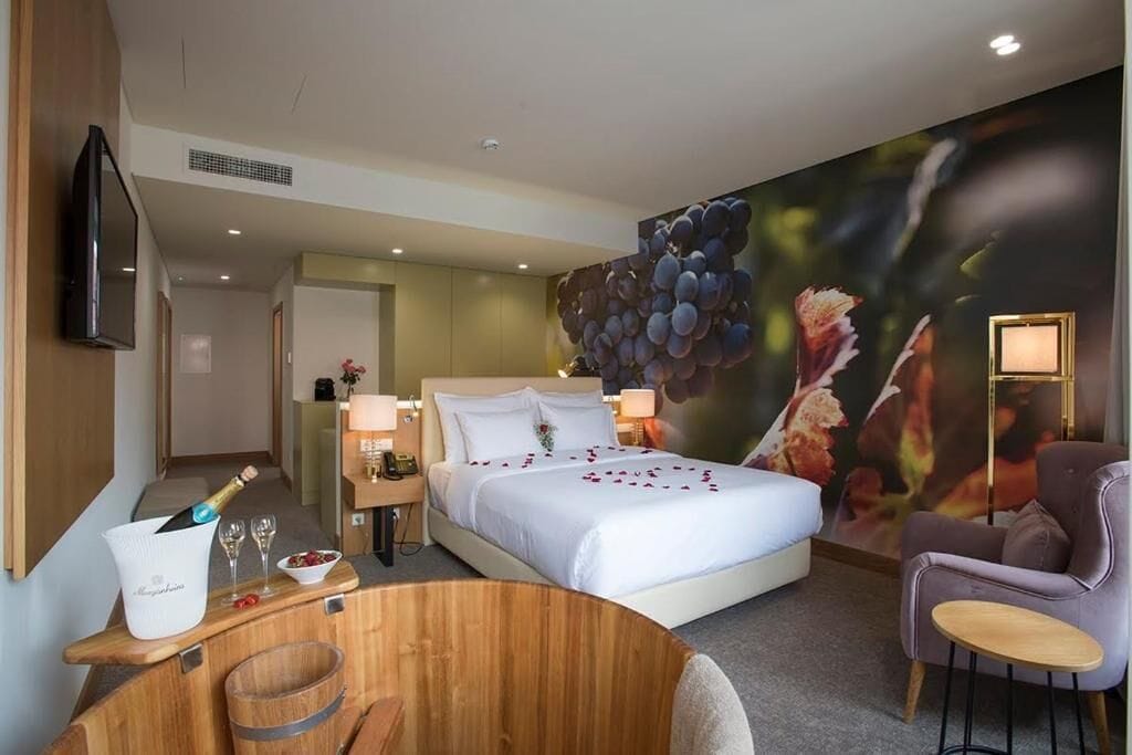 signature suite | minibar, in-room safe, desk, laptop workspace