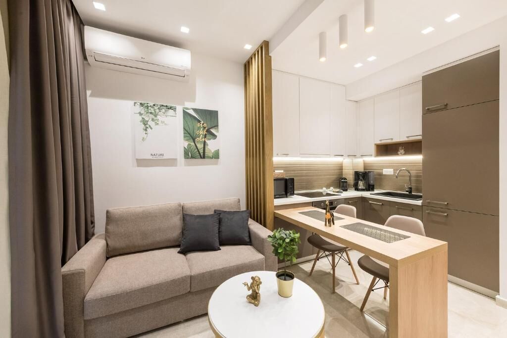 Comfort Apartment, 1 Queen Bed with Sofa bed | Living area | 45-inch Smart TV with digital channels, tablet