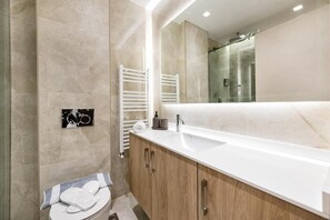 Hair dryer, towels, soap, shampoo
