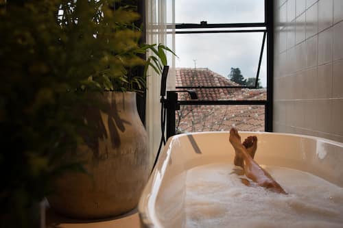 Presidential Suite | Bathroom | Designer toiletries, hair dryer, towels, soap