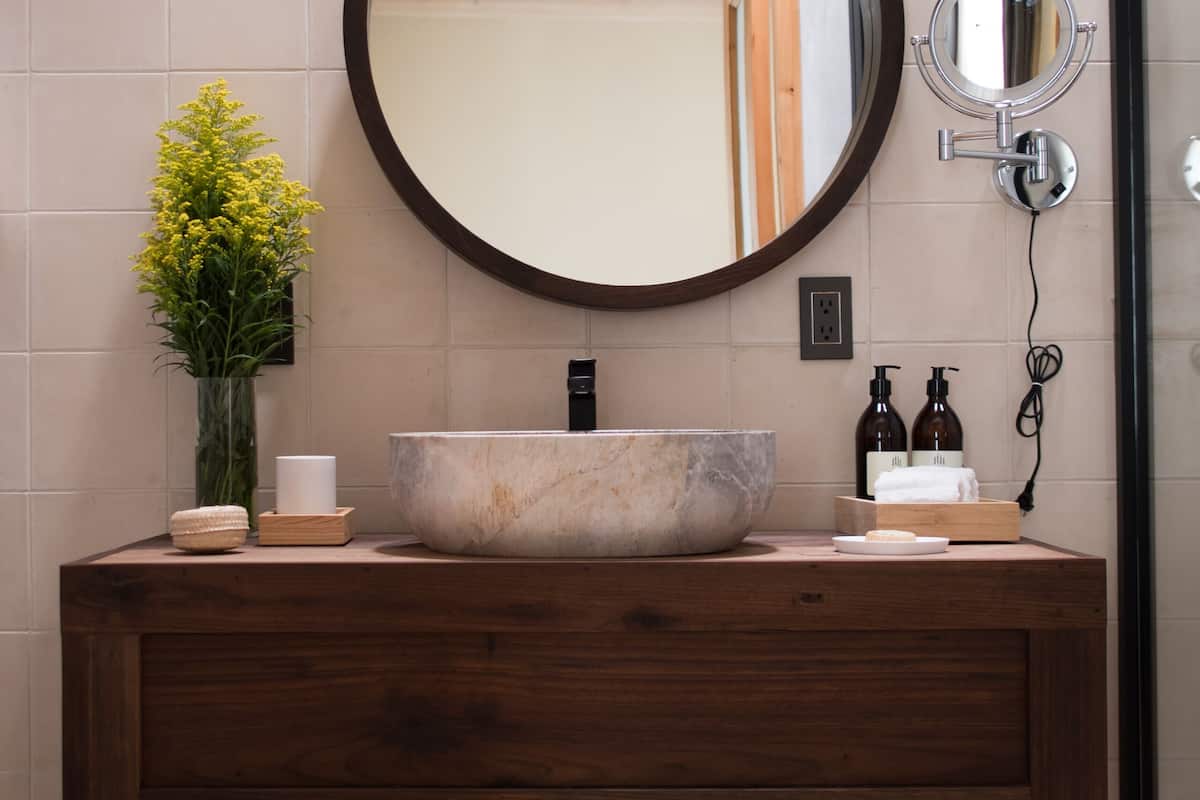 luxury suite | bathroom | designer toiletries, hair dryer, towels, soap