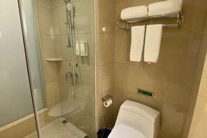 A bathroom with a glass-enclosed shower, a toilet, and a towel rack with two towels. - Vienna International Hotel (Tianjin Meijiang Convention and Exhibition Center) (Tianjin)