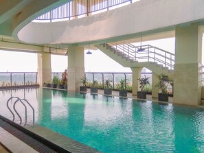 Outdoor pool - Brand New 1BR Apartment with City View at Atlanta Residences (Depok)