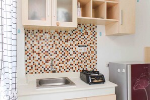 Room | Private kitchen - Simple and Cozy Living Studio Room at Bassura City Apartment (Jakarta)