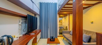 Homey and Comfort Living Studio Room at Dave Apartment
