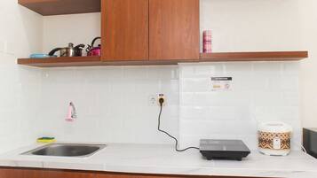 Fridge, stovetop, cookware/dishes/utensils