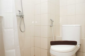Room | Bathroom - Nice and Elegant Studio at Riverview Jababeka Apartment (Cikarang)