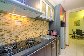 Fridge, stovetop, cookware/dishes/utensils