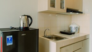 Private kitchen - Nice and Cozy Studio at Serpong Green View Apartment (South Tangerang)