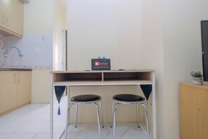 TV - Nice and Comfy 1BR Apartment at MT Haryono Residence (Jakarta)