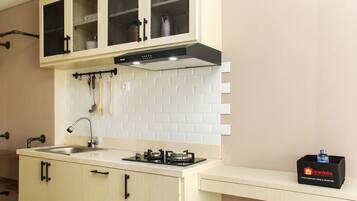 Fridge, stovetop, cookware/dishes/utensils