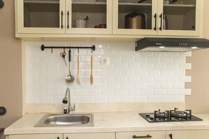 Private kitchen - New and Cozy Studio at Patraland Urbano Apartment (Bekasi)
