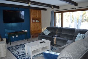 Smart TV, DVD player, foosball, books