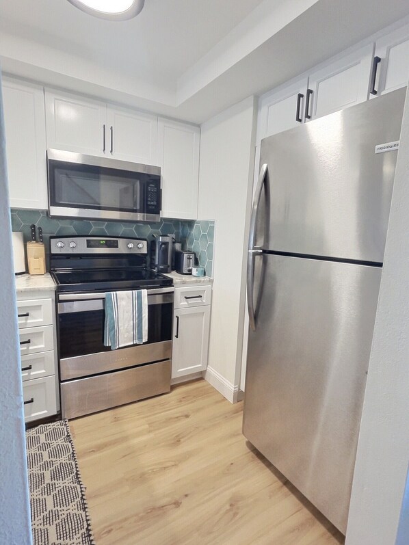 Fridge, microwave, oven, stovetop - Ocean View, Family friendly condo at Ola Grande (Cocoa Beach)