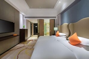 A hotel room with a large bed, a flat-screen TV, and a modern design. - Hefei Guangfu Chenmao Hotel (High-tech Zone West Bus Station Subway Station) (Hefei)