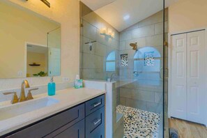 Combined shower/bathtub, hair dryer
