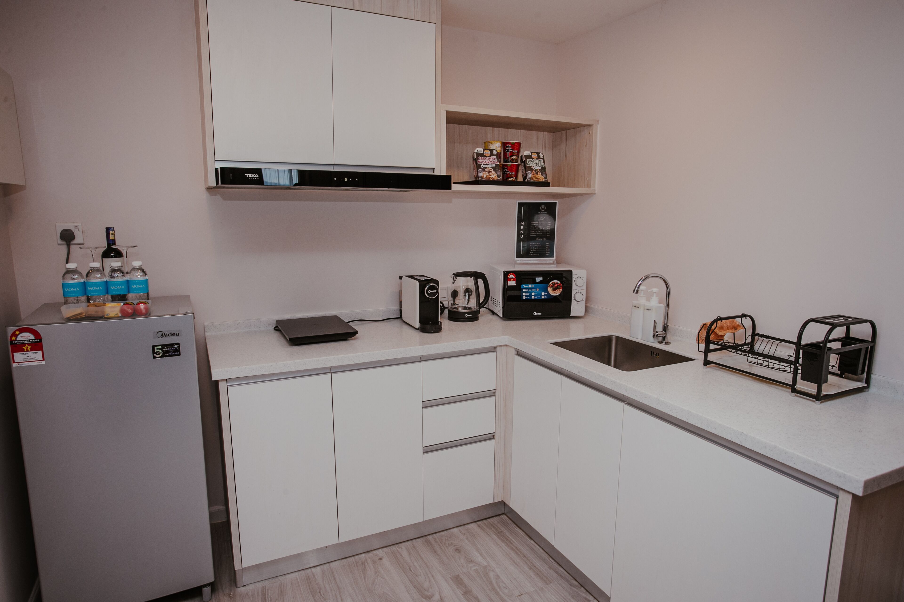 executive suite | private kitchen | espresso maker, electric kettle, dining tables