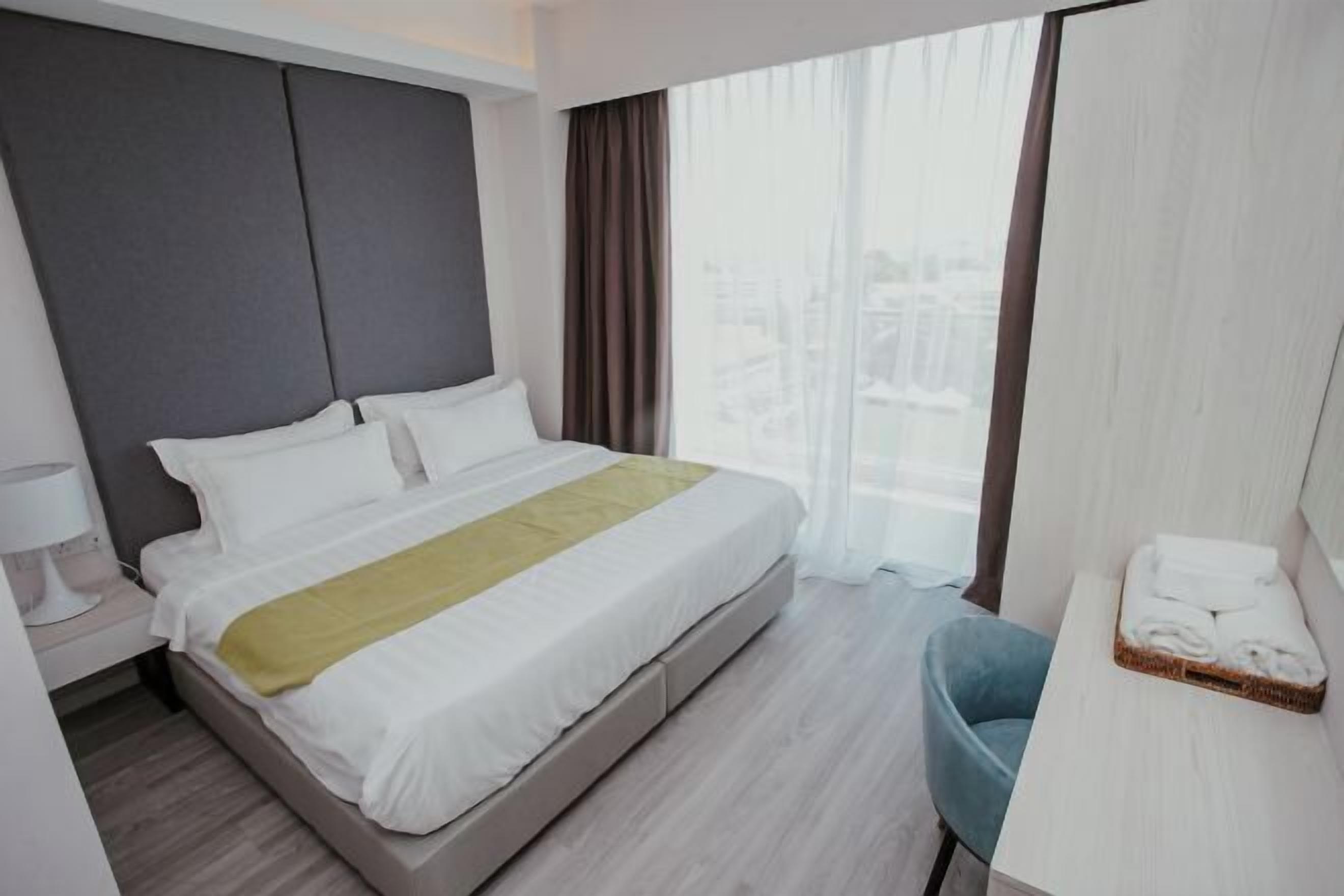 Minibar, desk, laptop workspace, blackout curtains