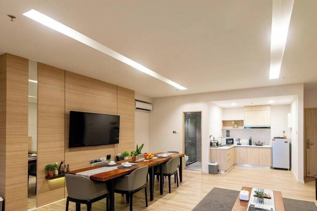 2-Bedroom Executive Suite with City View | Minibar, desk, laptop workspace, blackout curtains