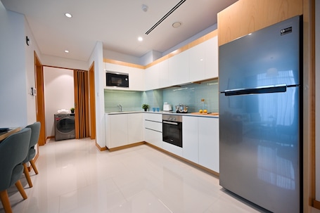 Luxury Suite, 1 Bedroom | Private kitchen | Fridge, microwave, oven, stovetop