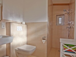 Shower, hair dryer, towels, toilet paper