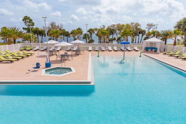 Outdoor pool, open 7:00 AM to 11:00 PM, free cabanas, pool umbrellas