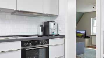 Micro-ondes, lave-vaisselle, cafetiĂšre/bouilloire