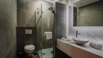 Shower, rainfall showerhead, hair dryer, towels