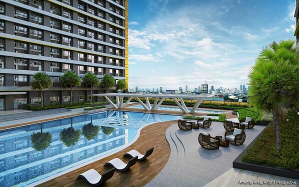 Outdoor pool, a heated pool - 1 BR Fully Furnished Condo in Mandaluyong with Pool and Parking - Fame1, 2021 (Mandaluyong)