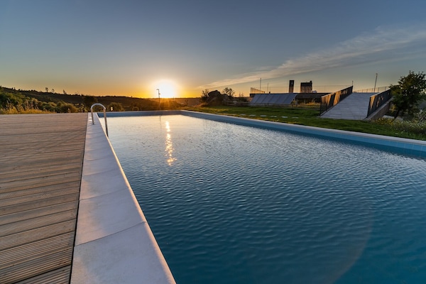 Outdoor pool, pool umbrellas, sun loungers