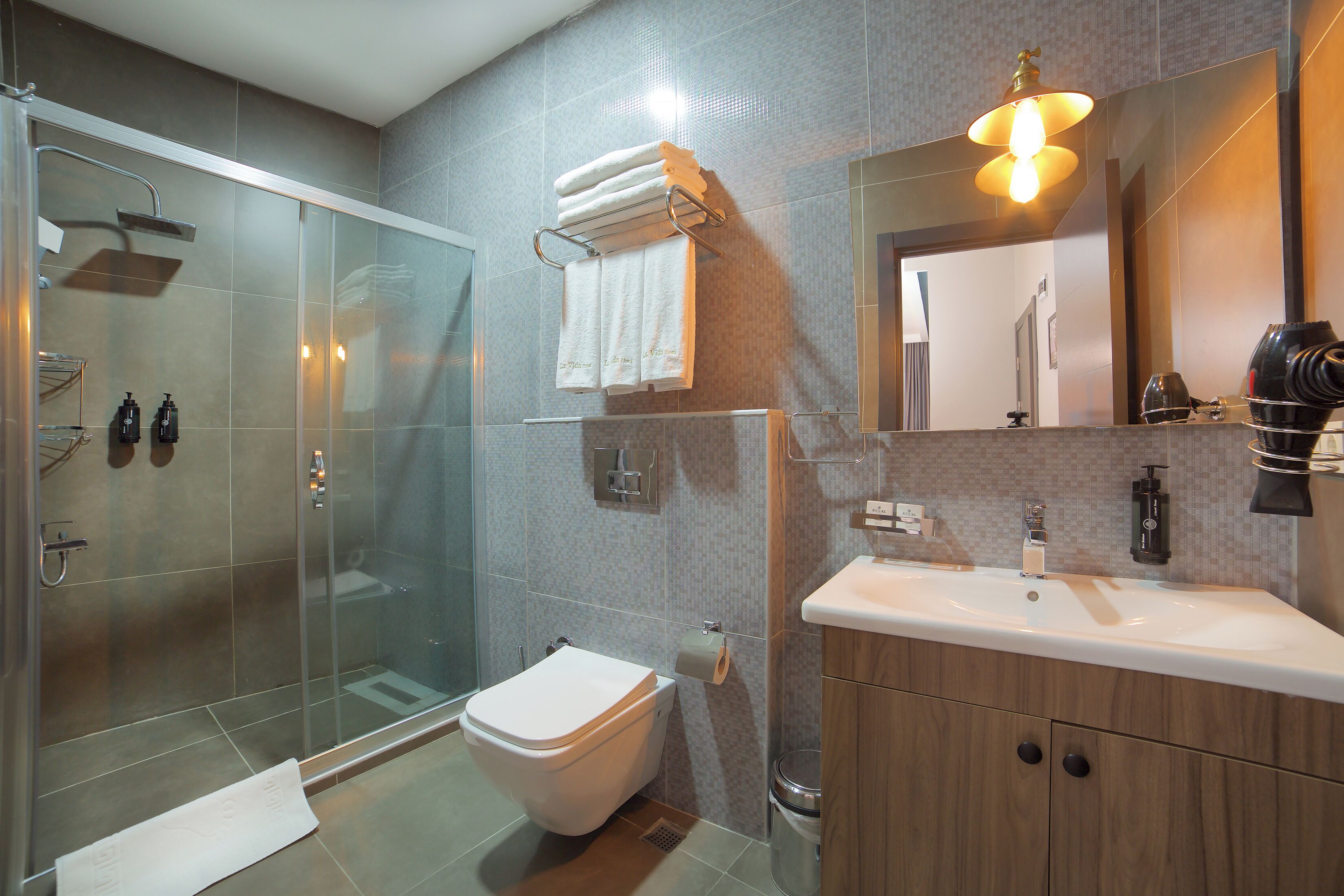 free toiletries, hair dryer, bathrobes, slippers