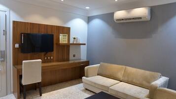 32-inch flat-screen TV with satellite channels, TV