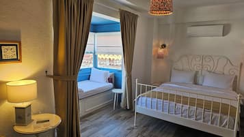 Deluxe Triple Room | Memory-foam beds, free minibar items, individually decorated