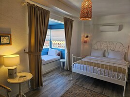 Deluxe Triple Room | Memory foam beds, free minibar items, individually decorated