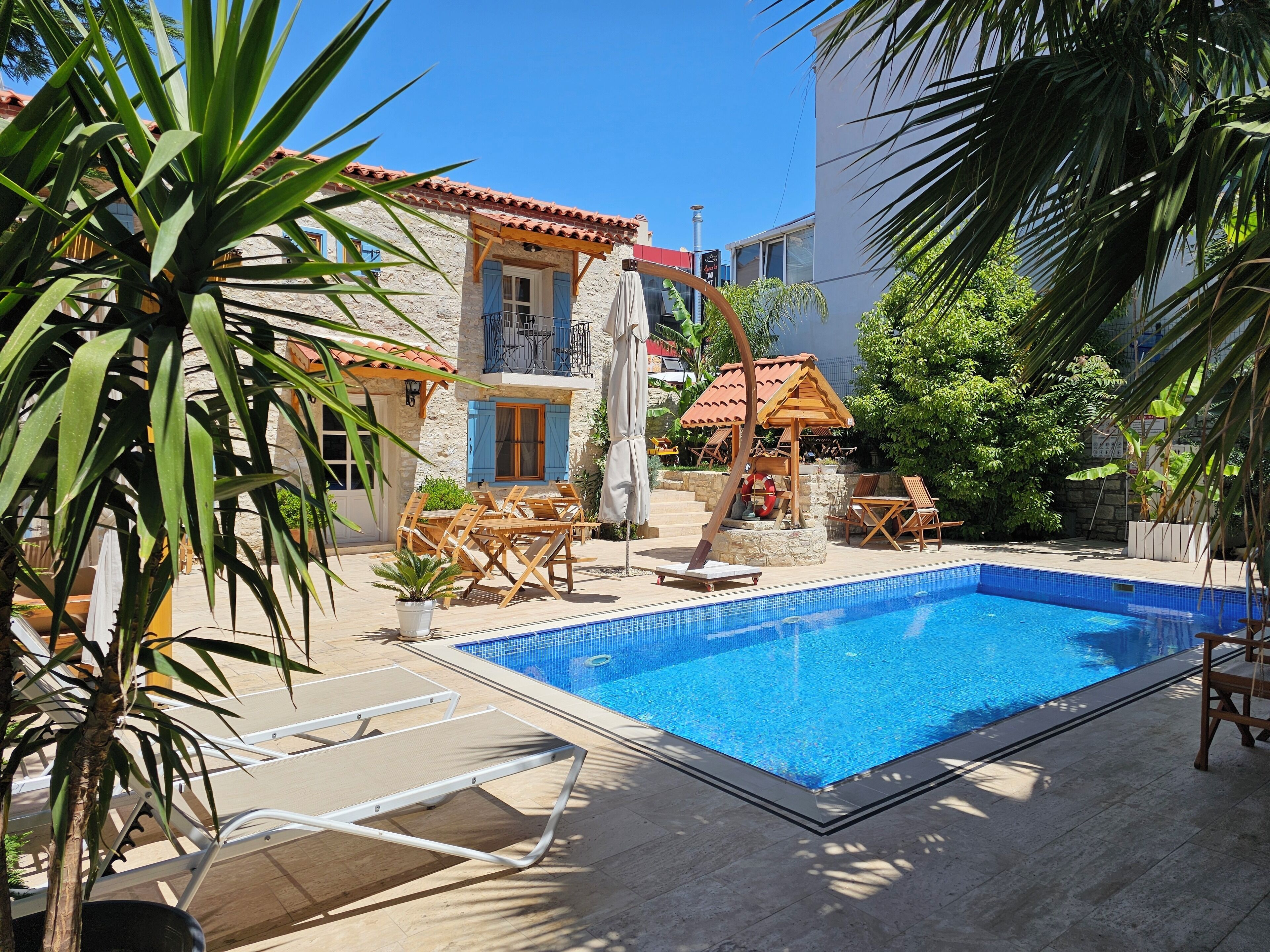 Seasonal outdoor pool, open 10:30 AM to 6:00 PM, sun loungers